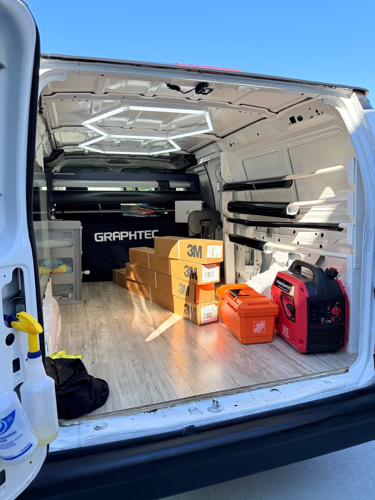 Richard working on window tint installation